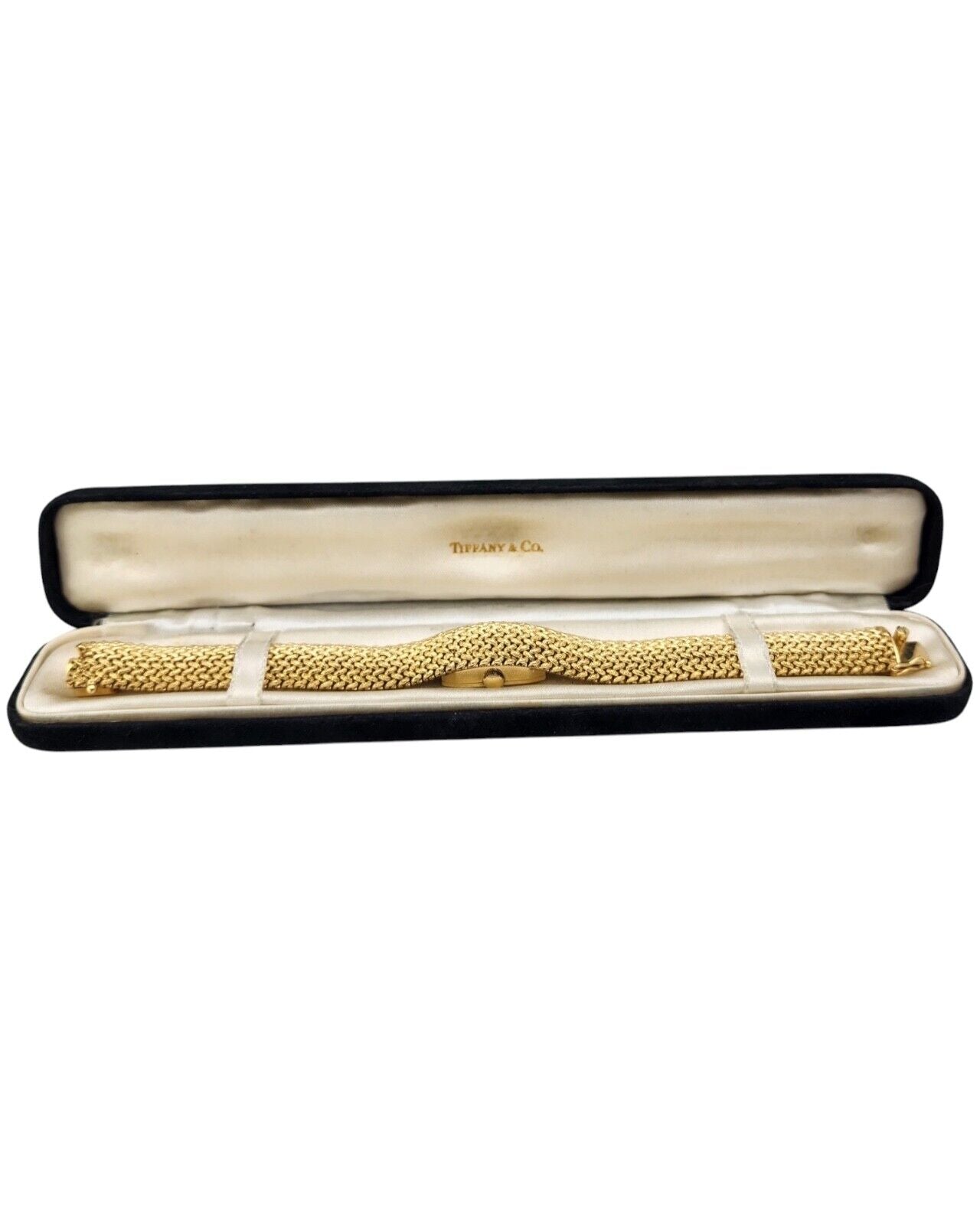 Tiffany & Co. 14K Gold Watch built into a gold bracelet (Covered Face Bracelet )