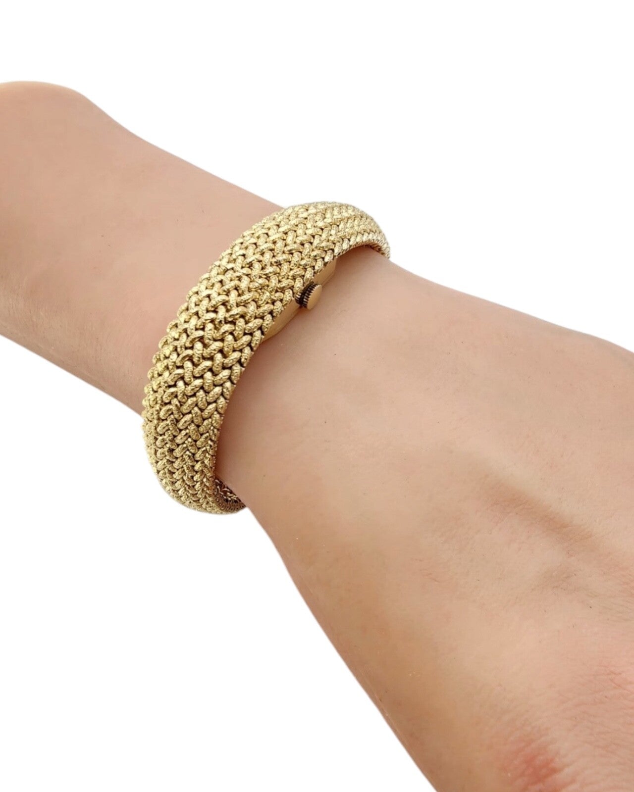 Tiffany & Co. 14K Gold Watch built into a gold bracelet (Covered Face Bracelet )
