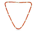 Beaded orange coral necklace with opal-like white beads and 14K yellow gold clasp