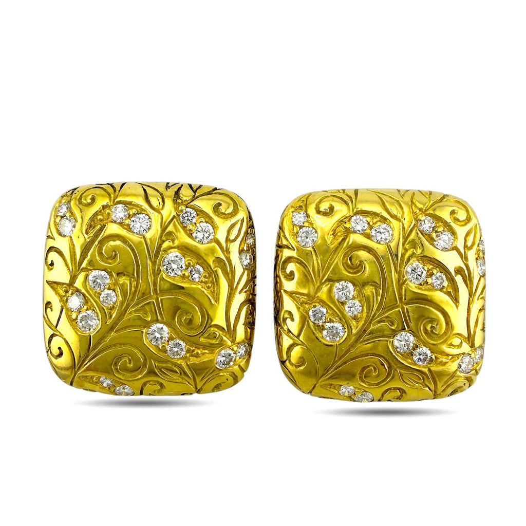 Front view of yellow gold square stud earrings with swirl engraving and diamond cluster