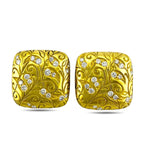 Front view of yellow gold square stud earrings with swirl engraving and diamond cluster