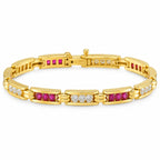 Yellow gold bracelet with ruby inset links and diamond sections, centered medallion.