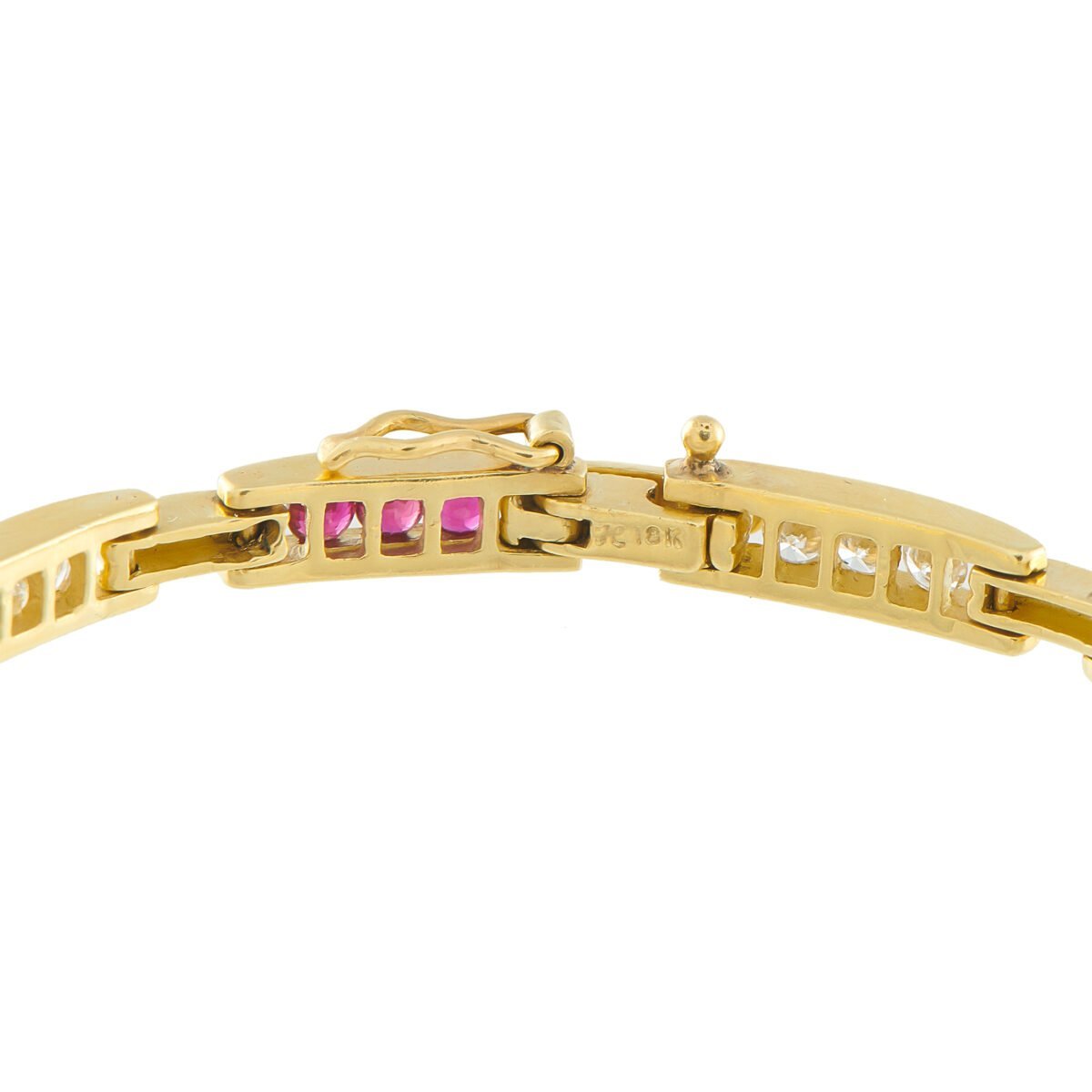 Yellow gold bracelet hinge clasp detail with ruby and diamond row settings.