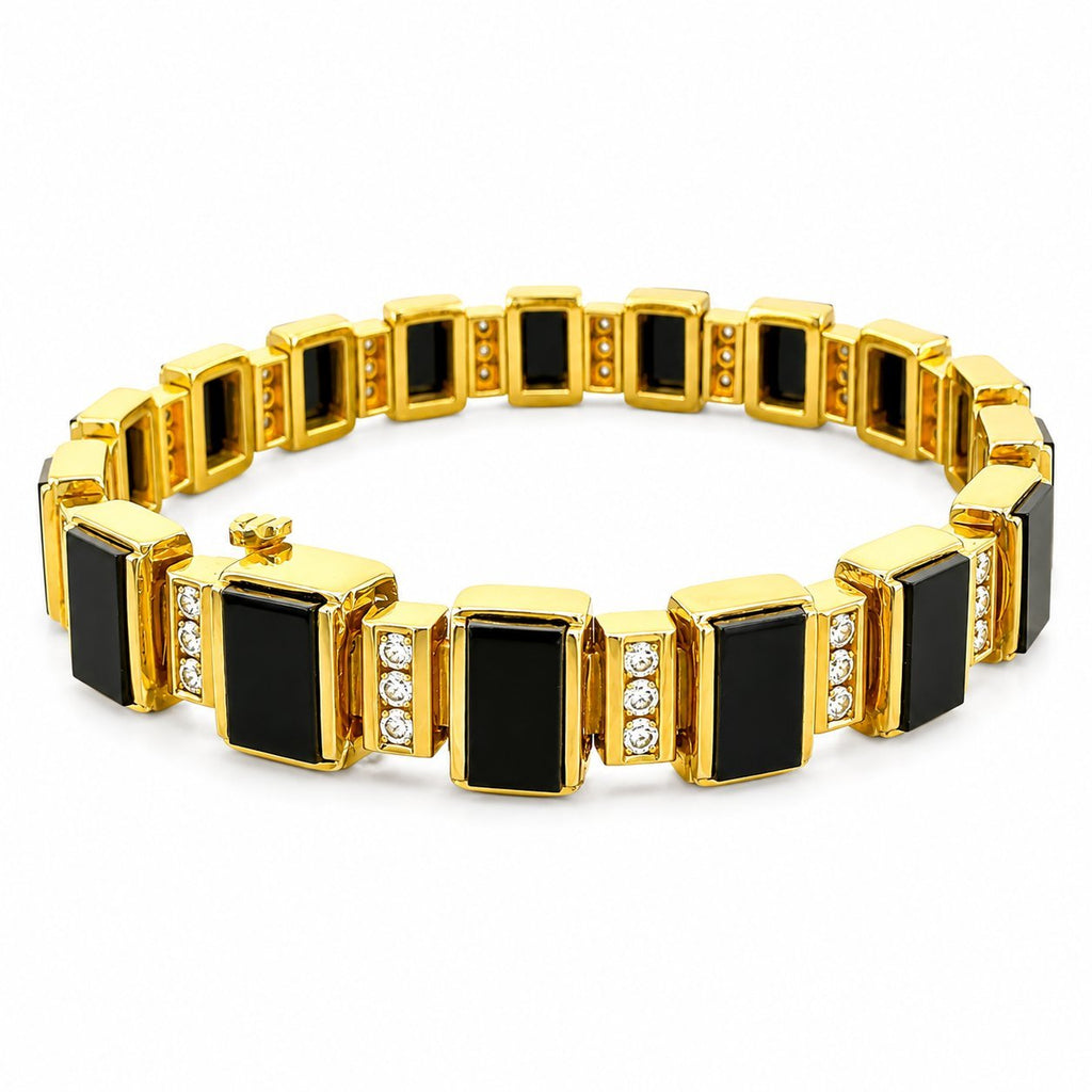 Gold bracelet with alternating black onyx squares and diamond accents in polished frames