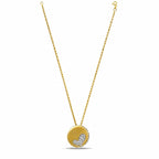 Two-tone gold heart pendant with diamond-set heart on a thin gold chain.