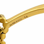 18K yellow gold ring band close-up with AU 750 hallmark and size mark 14