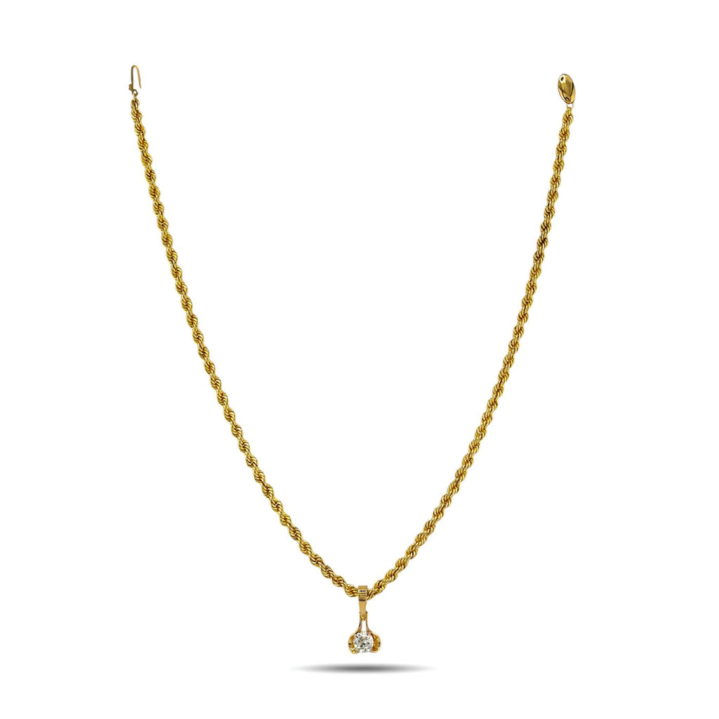 Gold rope necklace with centered round diamond pendant