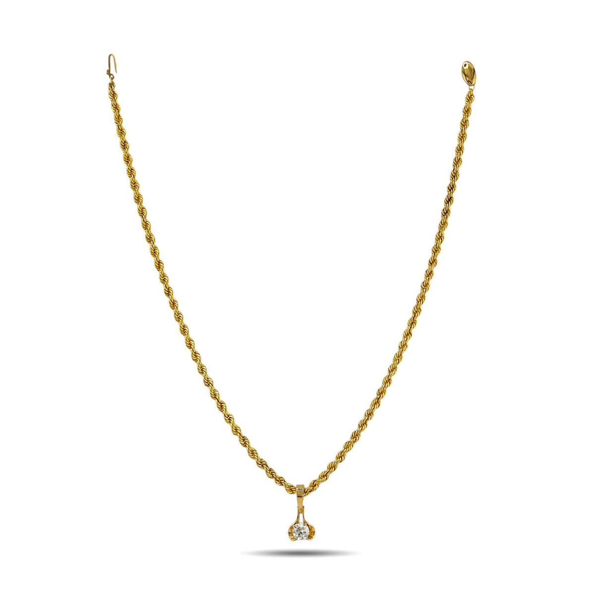 Gold rope necklace with centered round diamond pendant