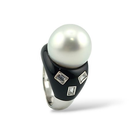 White gold ring with pearl cabochon, black onyx band, emerald-cut diamond accents