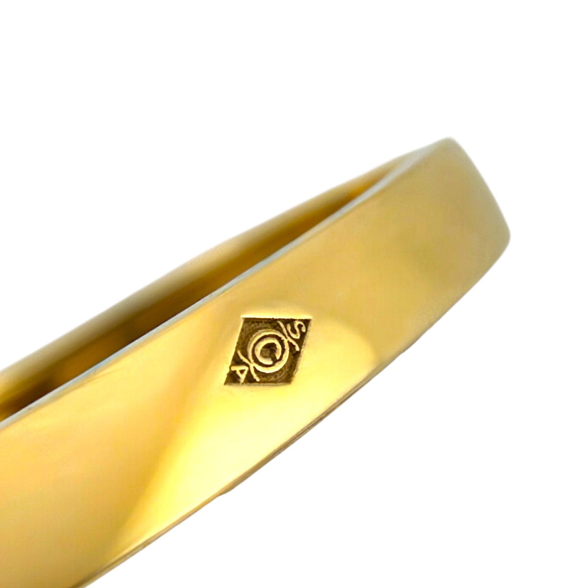 Van Cleef & Arpels ring close-up of a hallmark stamped on the gold band