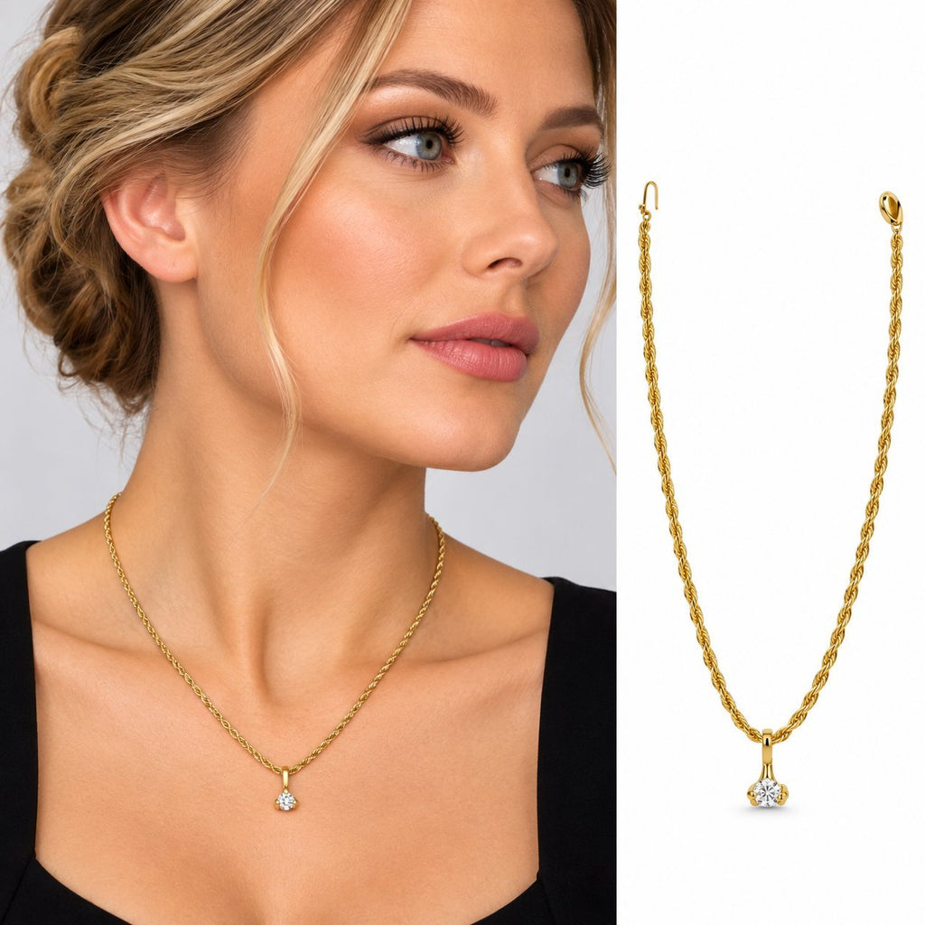Gold rope necklace with small heart-shaped diamond pendant