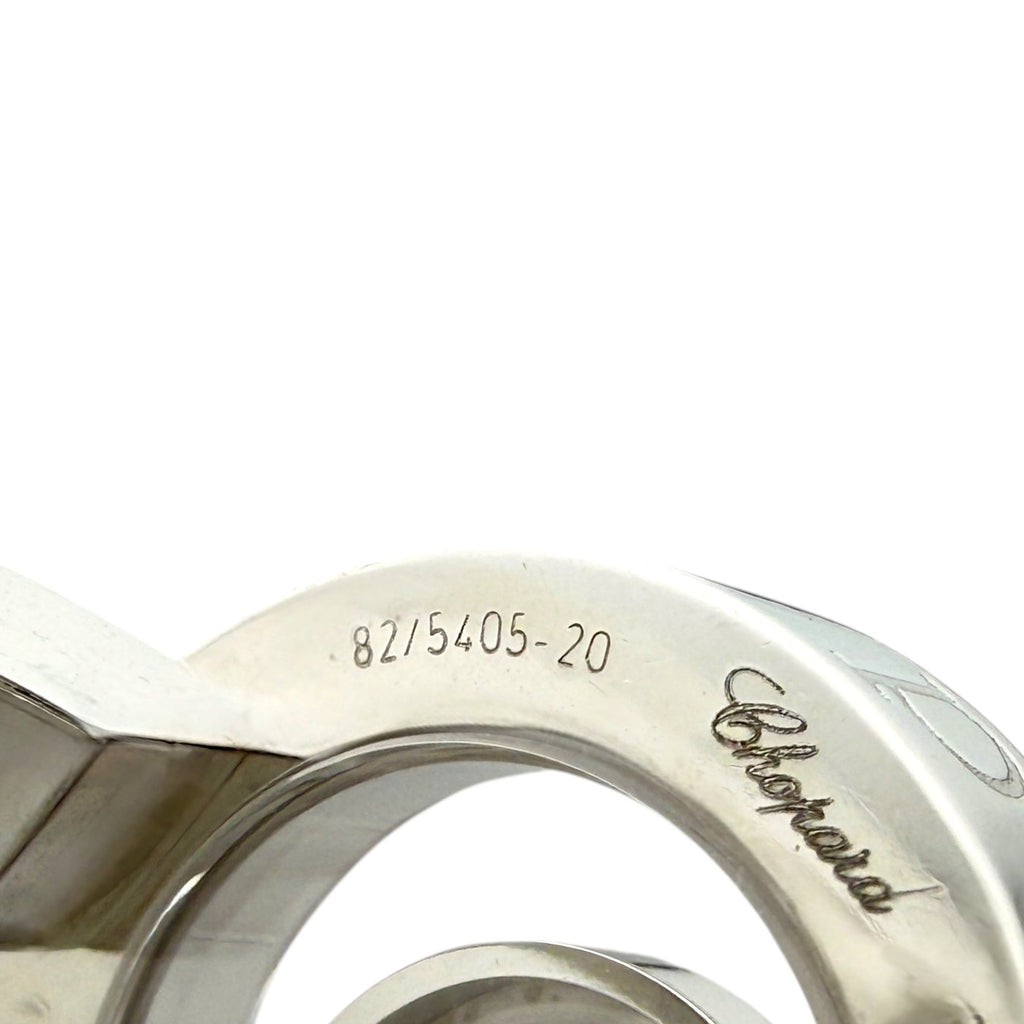 Close-up of inner band hallmark numbers and engraving on white gold ring
