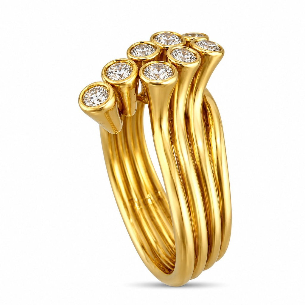 Sonia B. gold swirl ring shown upright, with diamond bezels atop parallel bands
