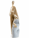 Porcelain Holy Family figurine: Mary holding Baby Jesus in cream and blue robes