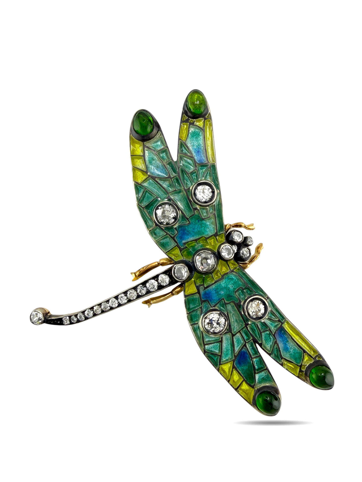 Dragonfly brooch with arched jeweled body, green-blue-yellow enamel, and sparkling stones