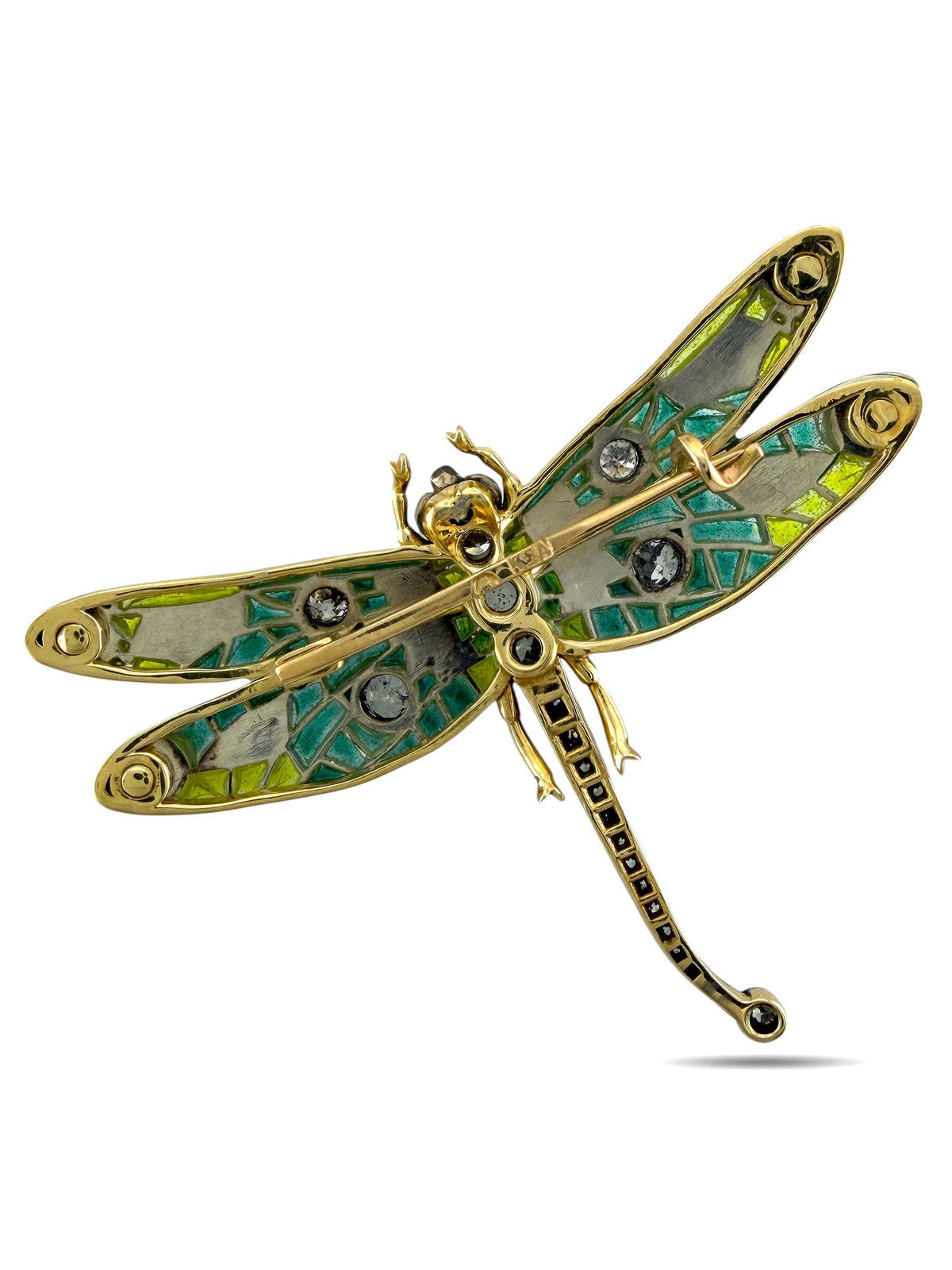 Enamel dragonfly brooch with green-blue body and gold tone outline, round stone details