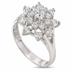 14K white gold diamond cluster ring with round stones in an ornate openwork setting