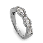 18K White Gold Wedding Band – This band ring is elegant and glimmers with the pristine beauty of white diamonds