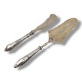Antique dessert serving knife and cake server with silver handles and gold-toned blades