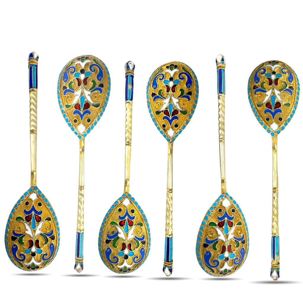 Six-piece enamel spoon set with blue-and-gold teardrop bowls and twisted gilded handles