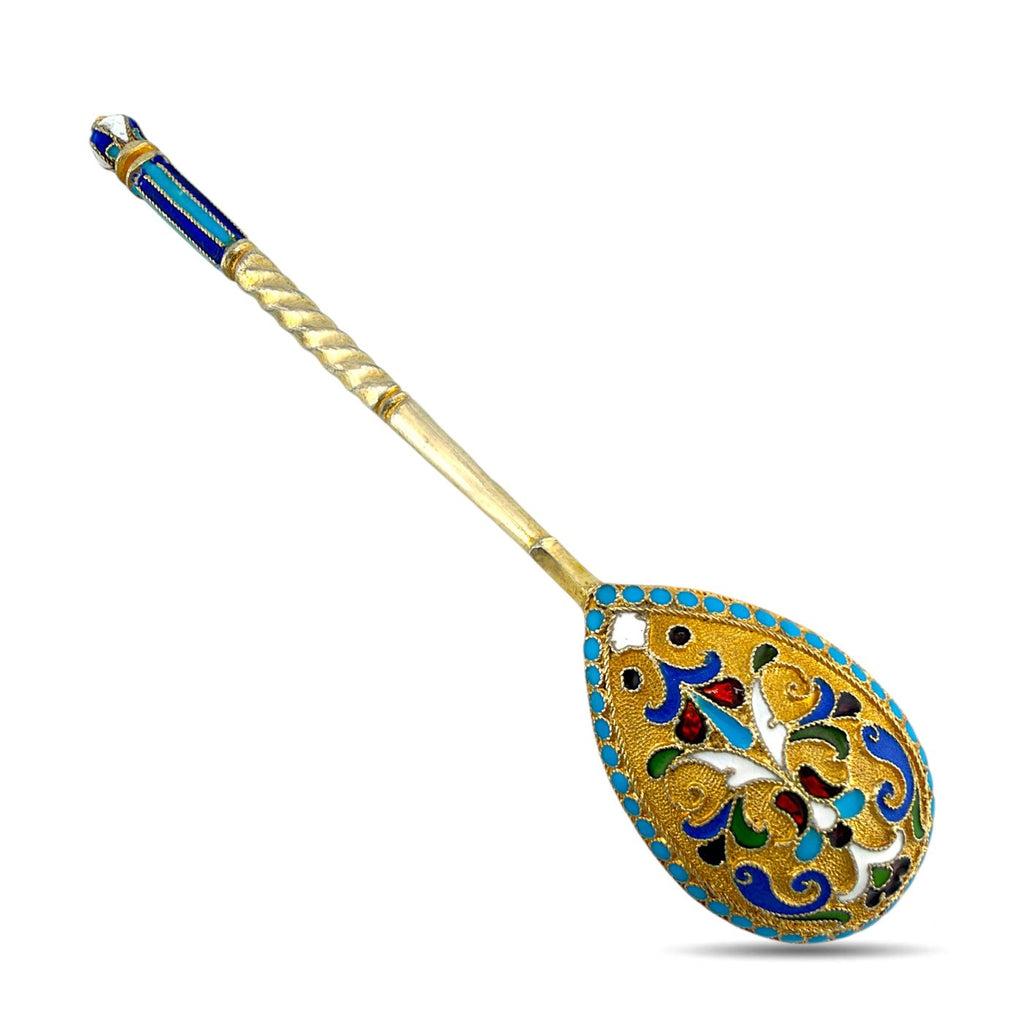 Gilded enamel spoon with blue enamel border and ornate blue-and-gold teardrop bowl