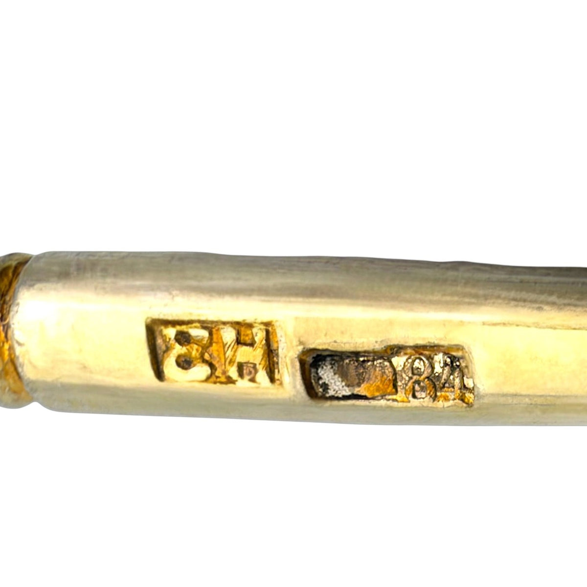 Spoon handle closeup with maker marks and '84' zolotnik stamp