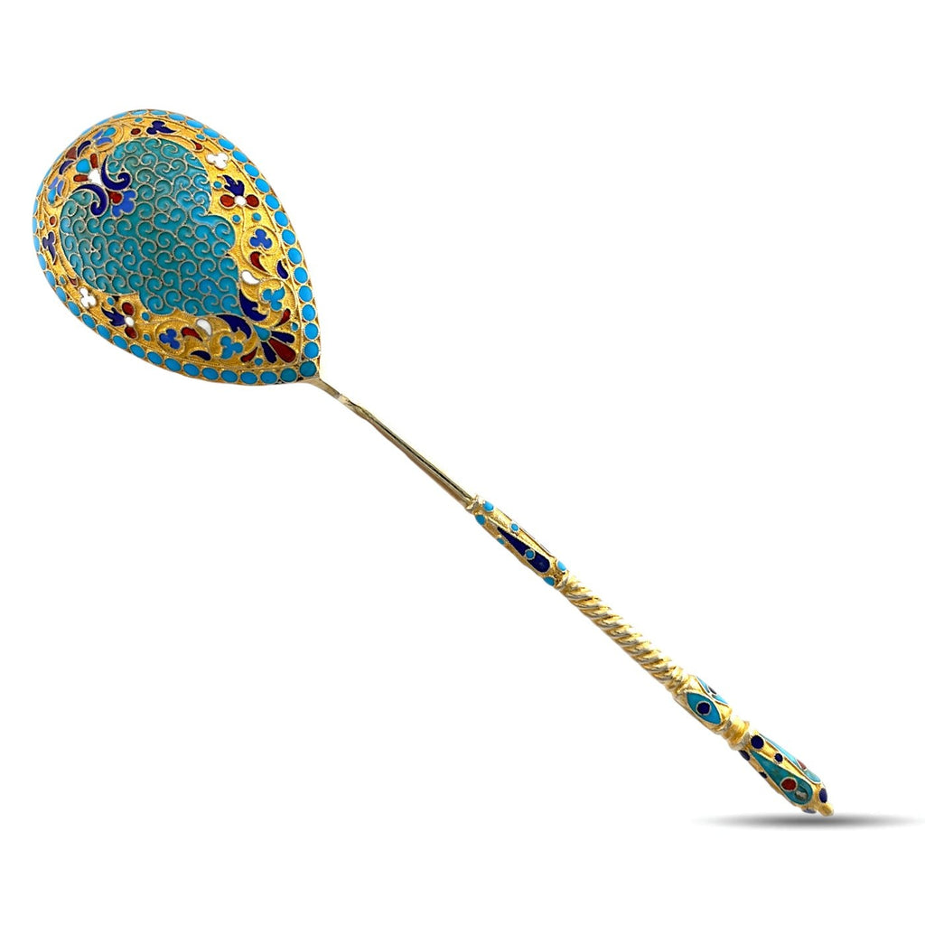 Antique enamel spoon with blue-gold oval head and long decorated handle