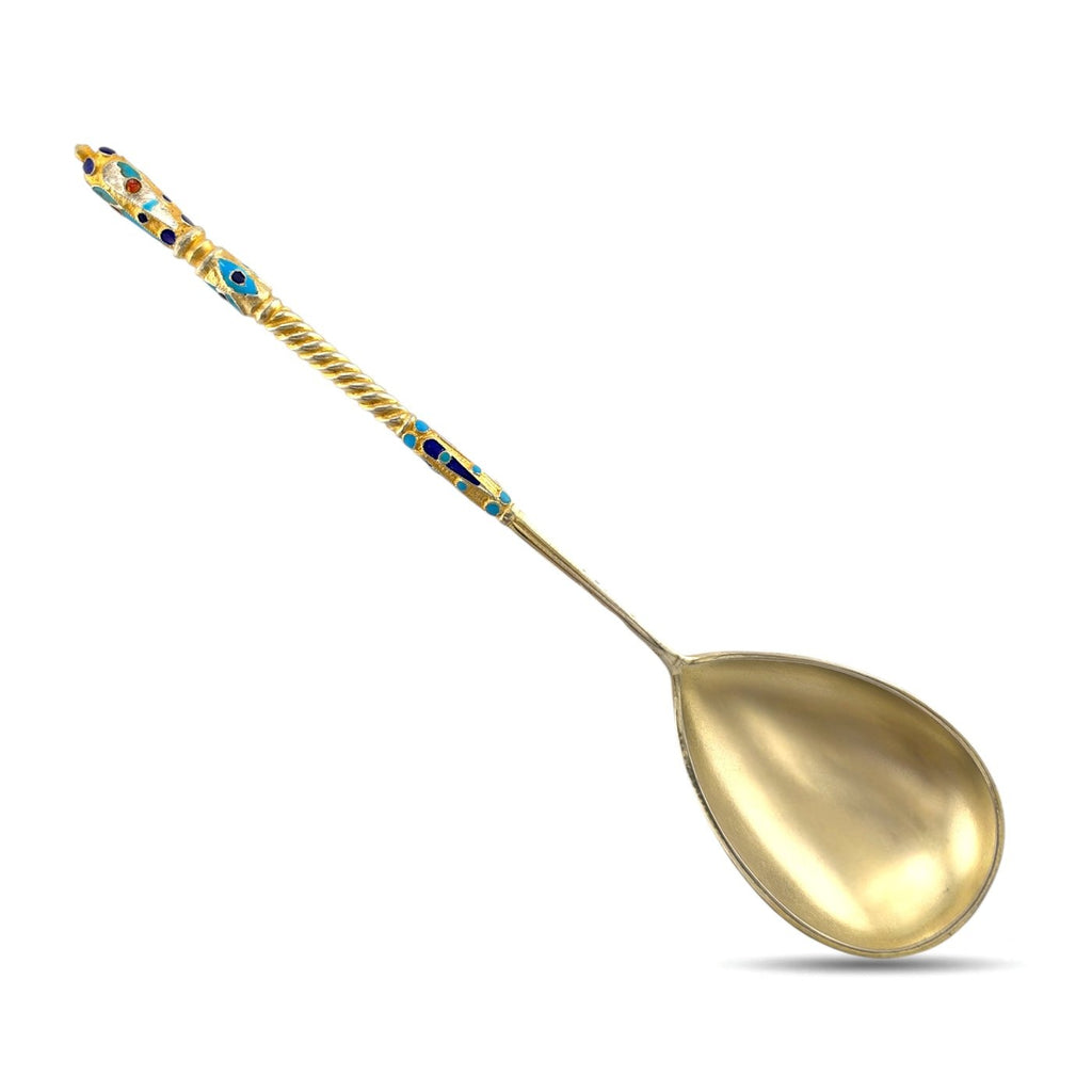 Antique enamel spoon with blue-gold stem and gold-toned oval bowl