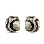 Pair of sculpted diamond earrings shown from a low front angle
