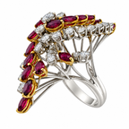 Statement ring in white gold with diamond halo and marquise ruby accents, gold prongs