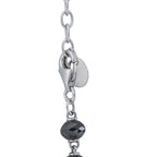 Diamond necklace clasp with link chain and dark round faceted stone and small bail