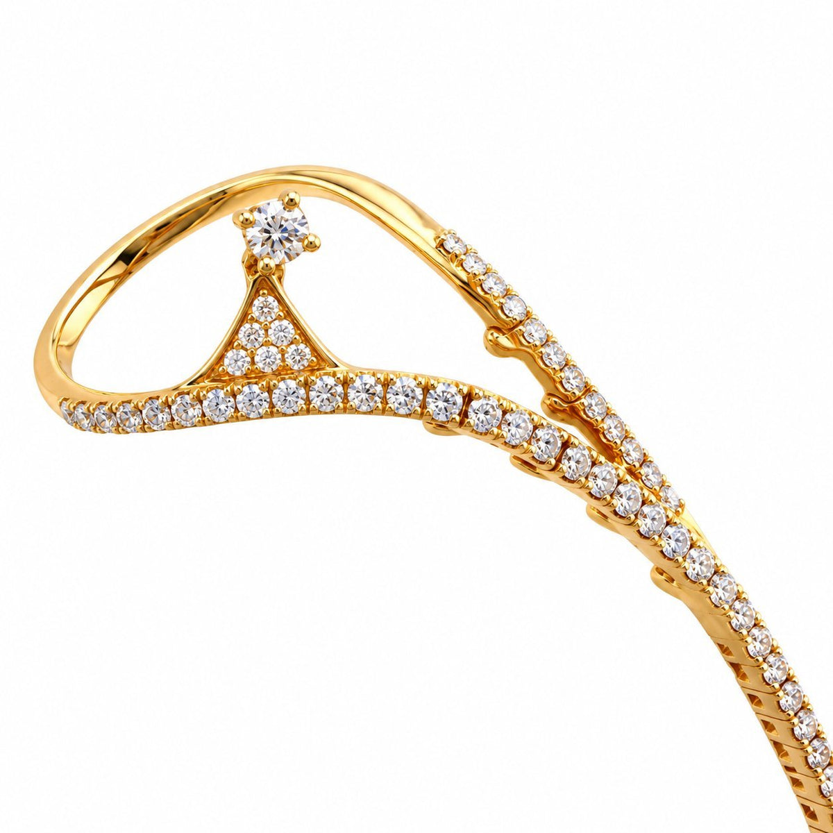 Close-up of the diamond-set finger loop and bangle detail