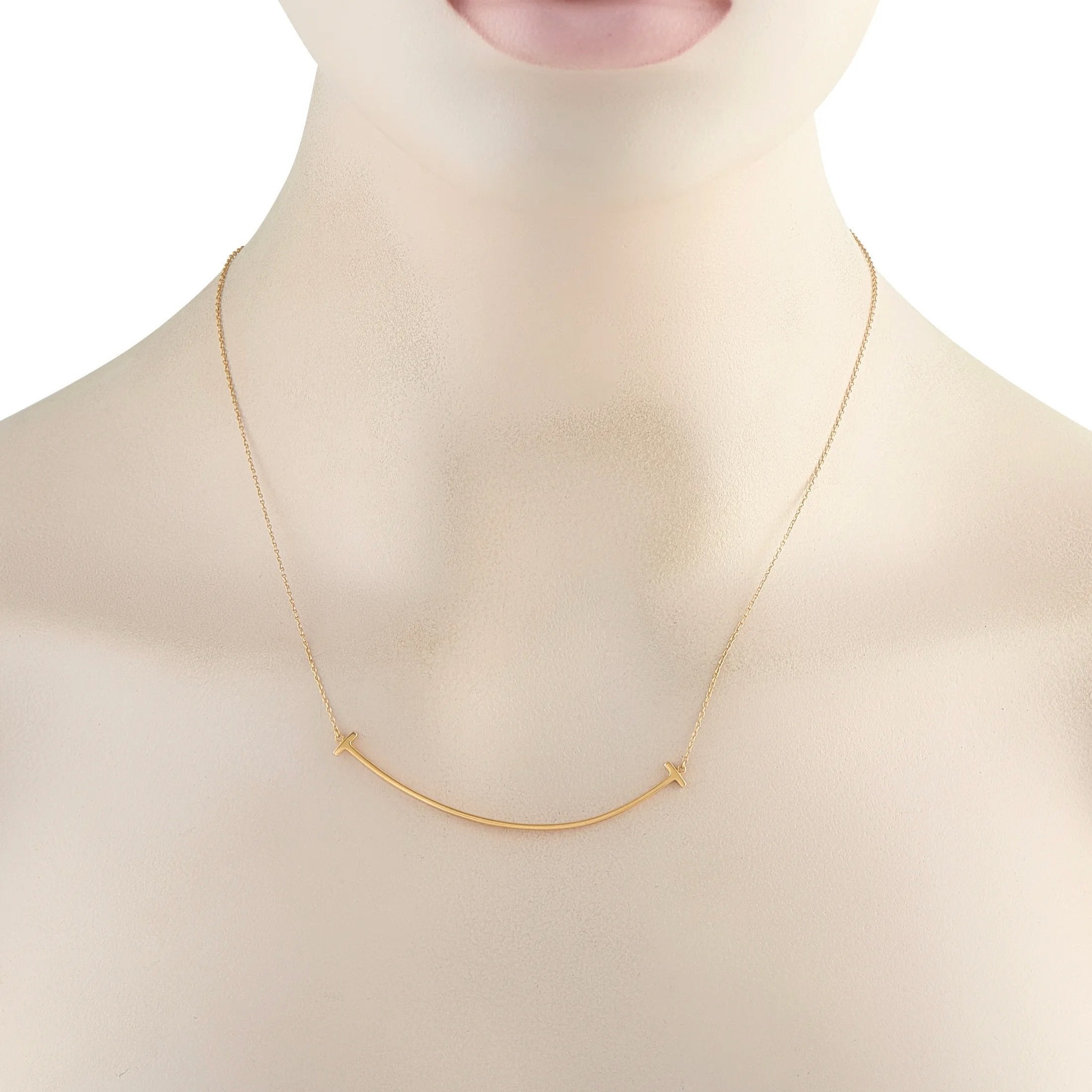 Tiffany & Co. - 18 kt. Yellow gold, Tiffany & Co. 18K Yellow Gold T Smile Necklace