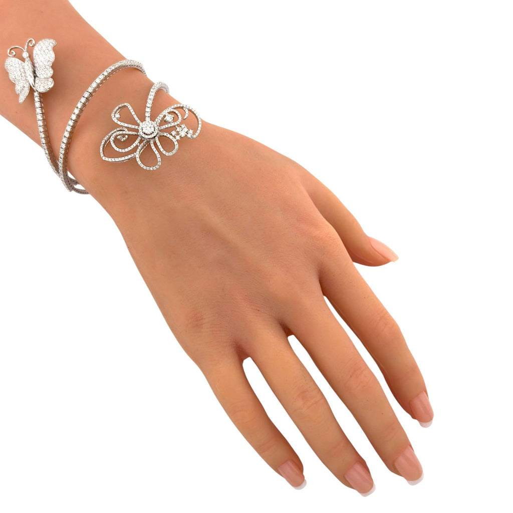 Diamond butterfly and openwork flower bracelet worn on the wrist
