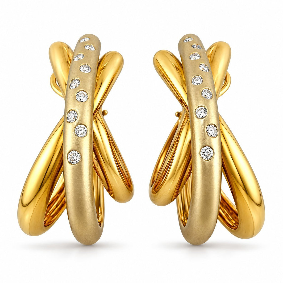 Tri-color gold clip-on earrings with oval diamond row on the front bar