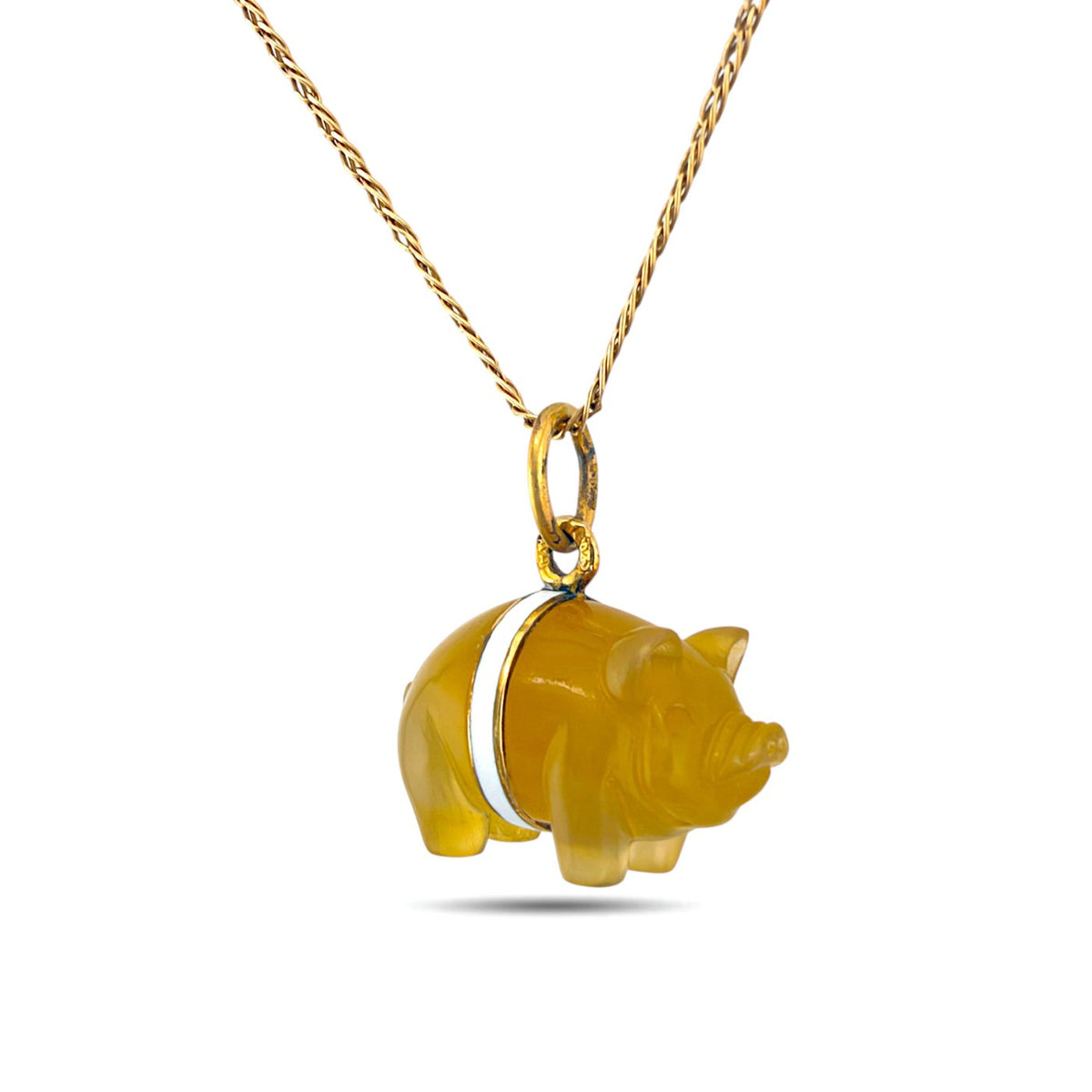 Pig pendant with a white enamel band and gold-tone chain, shown from the front side.