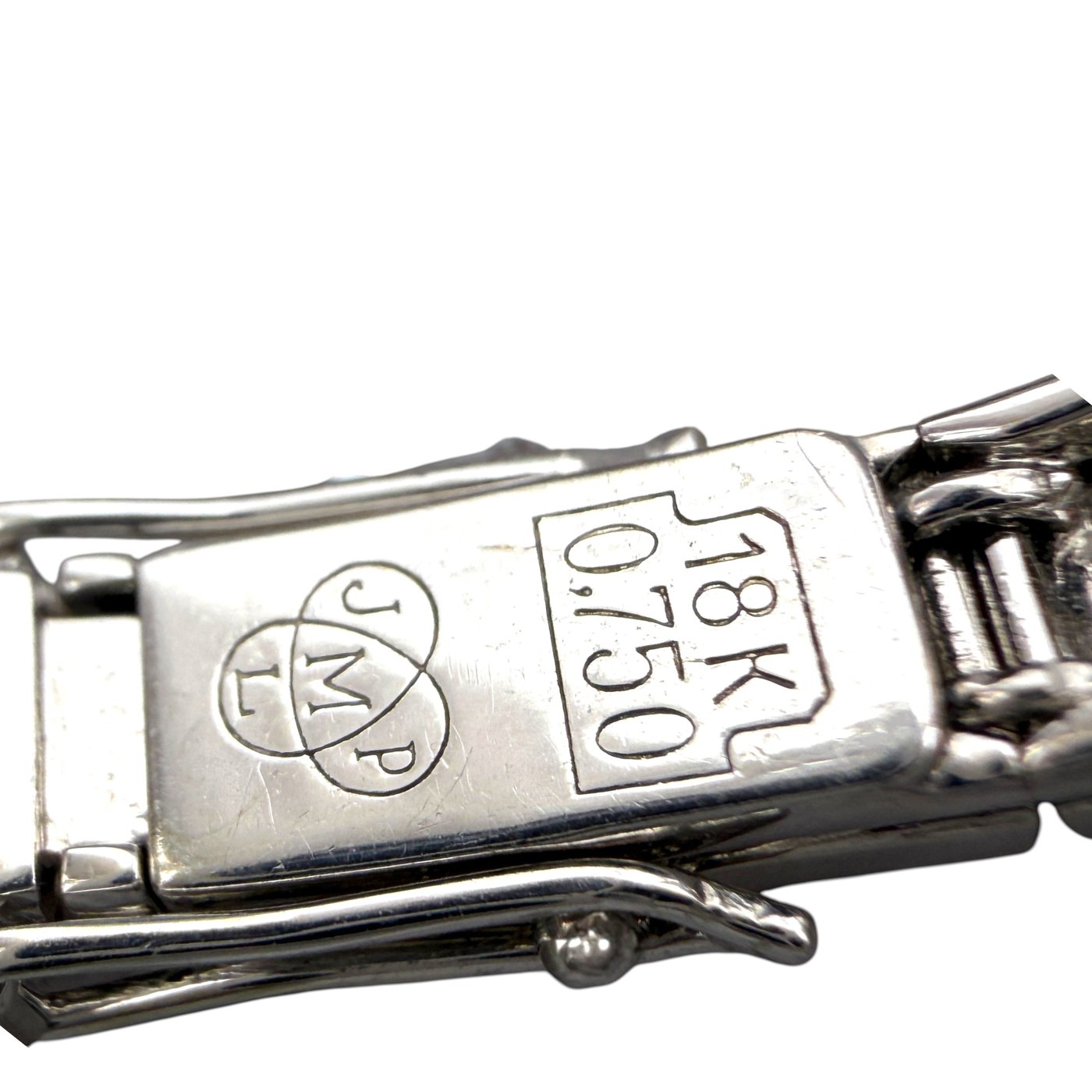 White gold bracelet clasp with 18K 750 stamp and maker mark