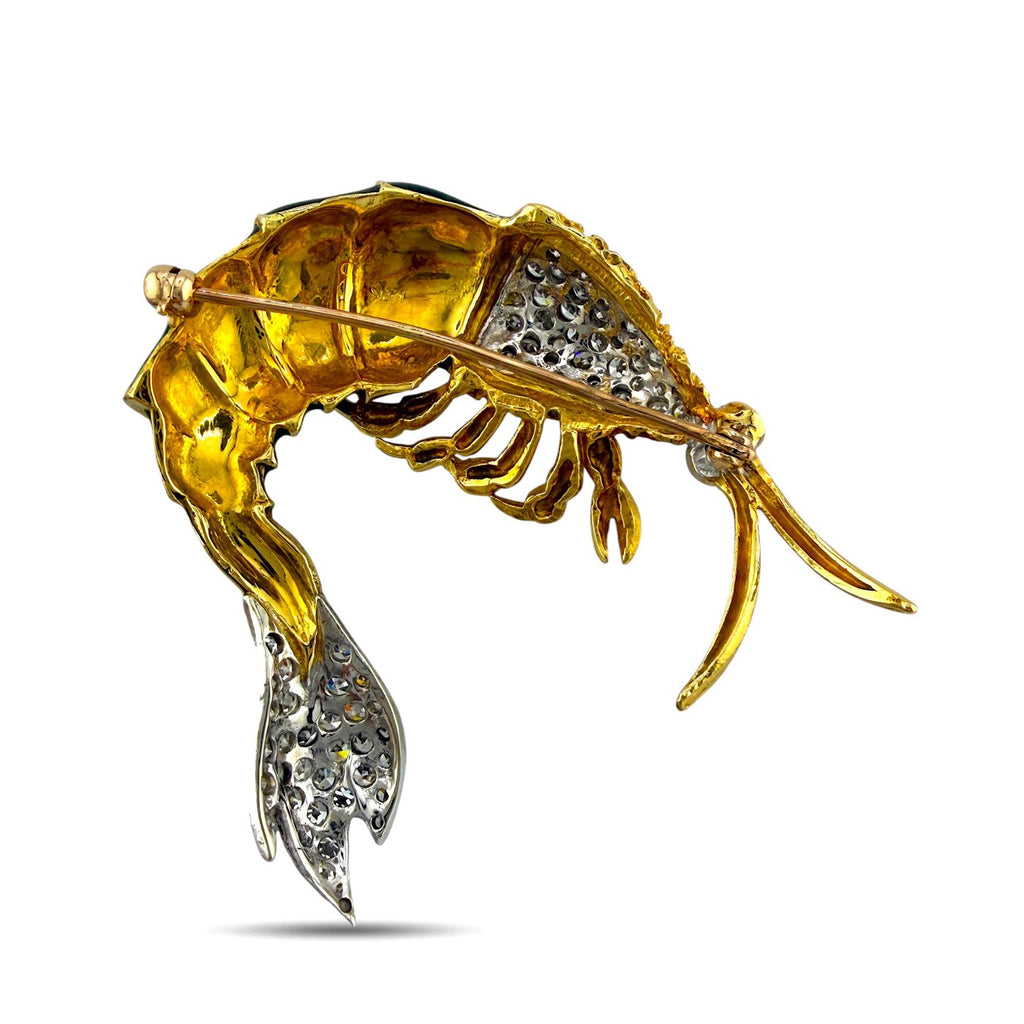 Krill brooch in yellow gold with diamond and sapphire accents