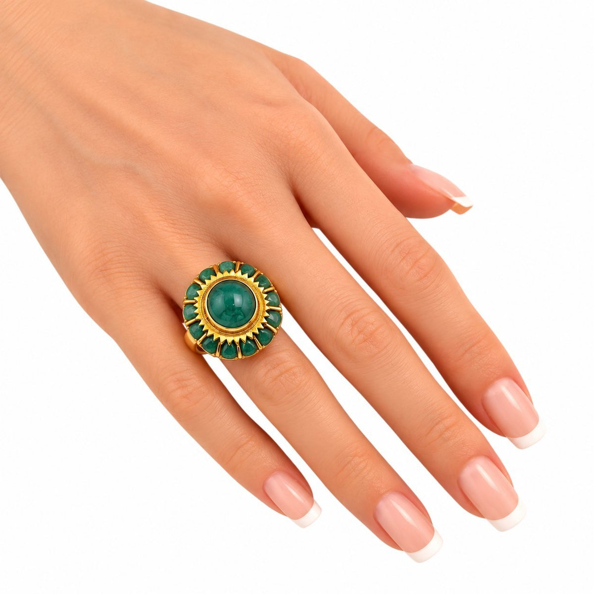 14K yellow gold jade cabochon ring on finger with green oval centerpiece