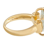 Yellow gold band close-up with AU 750 hallmark and horsebit-style setting