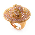 18K rose gold ring with dome setting and white and yellow diamonds