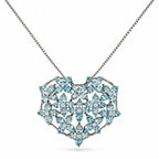 Heart-shaped pendant necklace with sky-blue gemstones and diamond accents, on chain