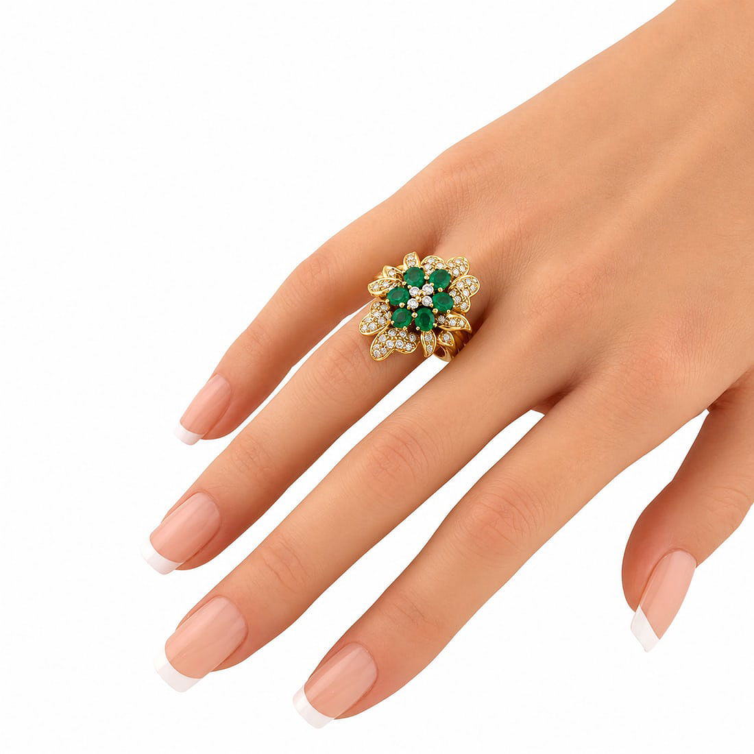 18K yellow gold emerald and diamond cluster ring on finger with green oval center stones