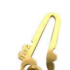 Gold pendant back with stamped "14K" marking and loop bail