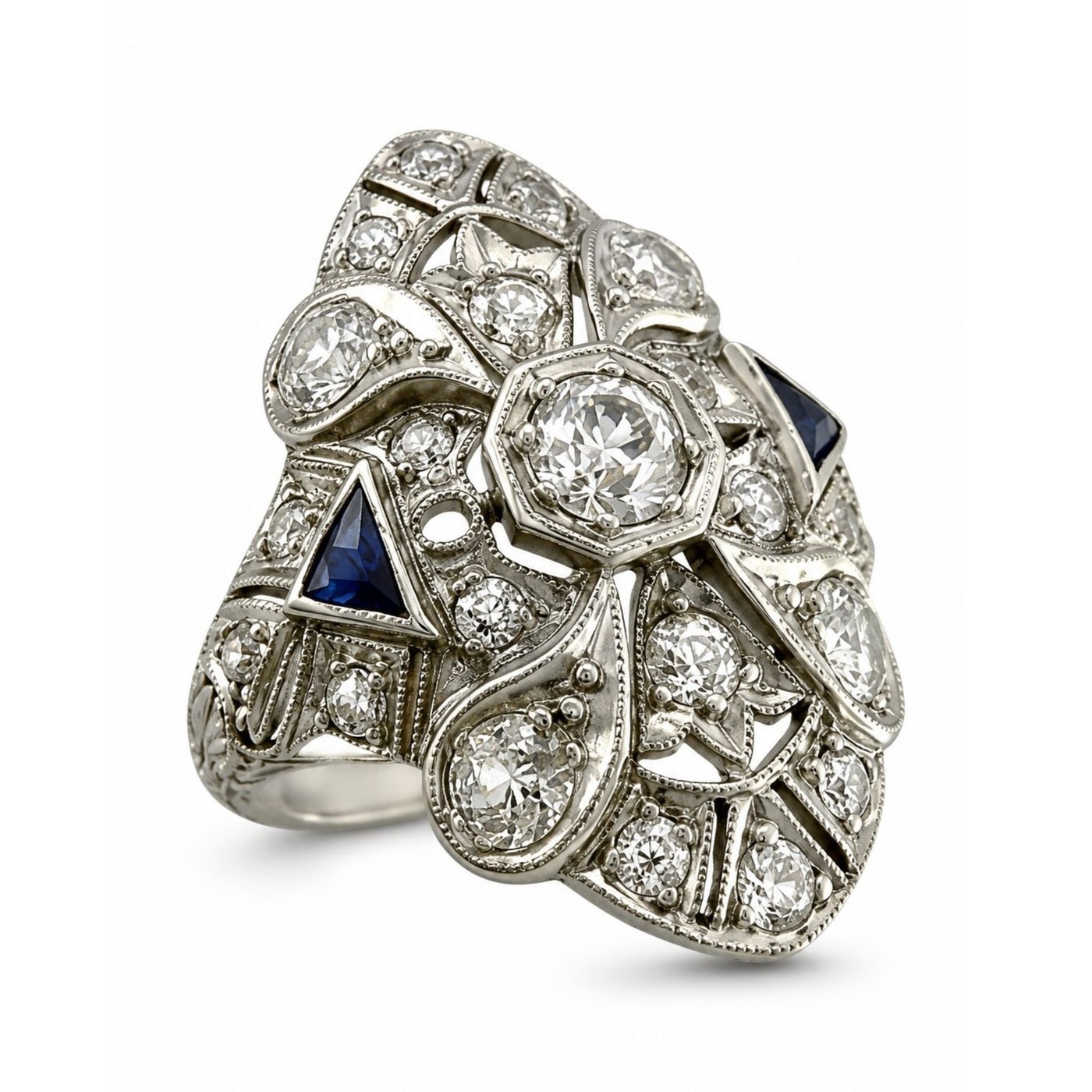 Art Deco diamond and sapphire ring with round center stone and ornate filigree, platinum-tone