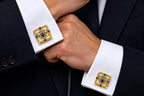 Gold-tone square cufflinks with sapphire-blue and clear gemstone accents