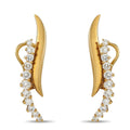Yellow gold clip-on earrings with cascading round diamonds and leaf-shaped front panels.