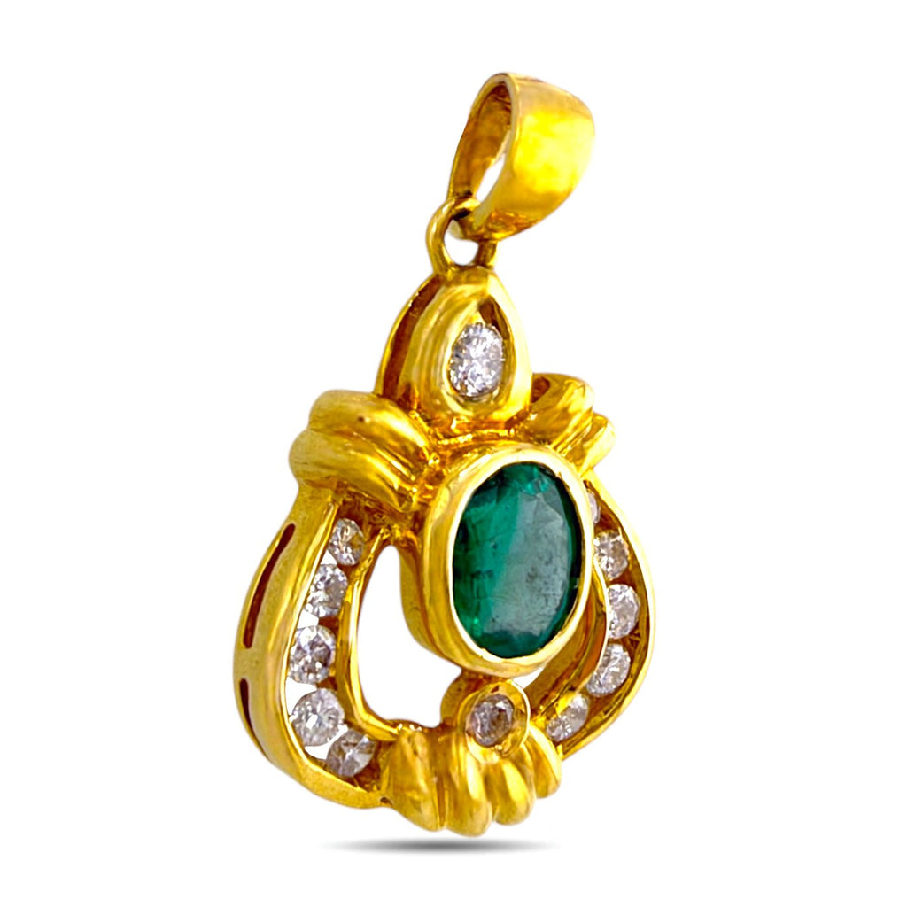 18k yellow gold pendant from angle, oval green emerald cabochon with diamond halo