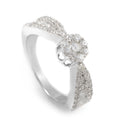 White gold diamond promise ring with heart-shaped clustered stones on a curved band