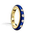 14K yellow gold ring with blue enamel band and three round diamonds on side